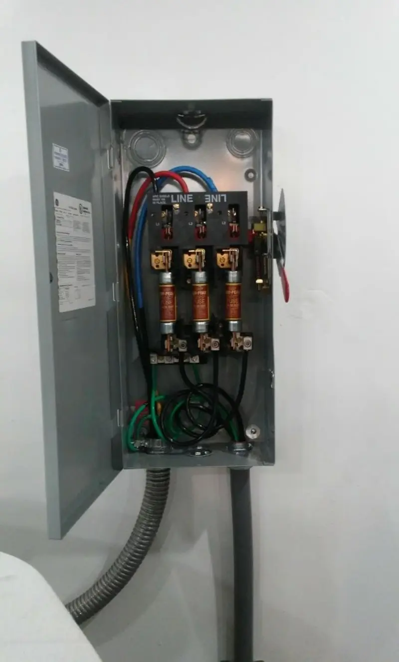 Three-phase disconnect switch installed for Smoke Detector Installation in Round Rock